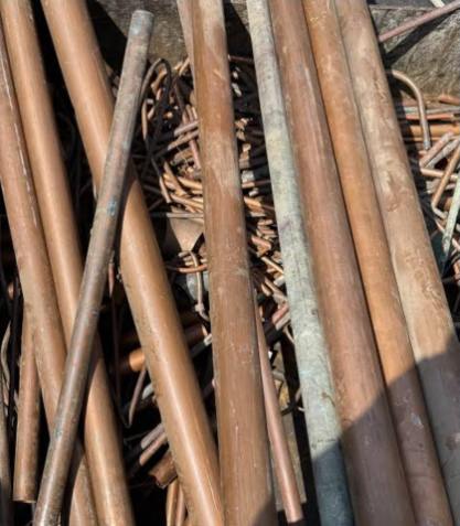 Pile of copper rods and pipes