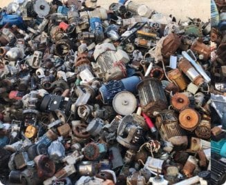 Pile of old electric motors ready for recycling